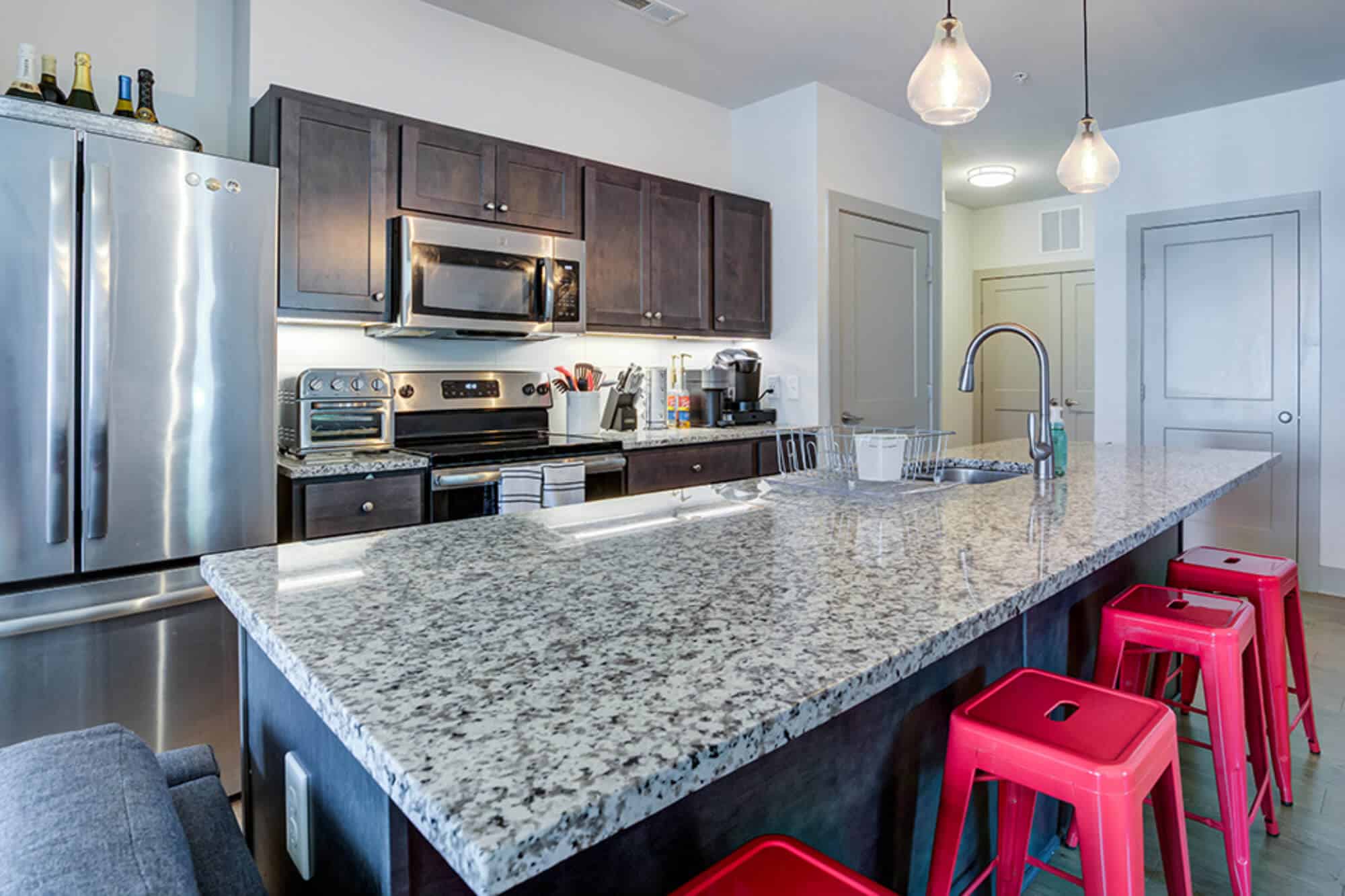 centennial luxury off campus apartments near nc state fully equipped kitchens with granite countertops and stainless steel appliances